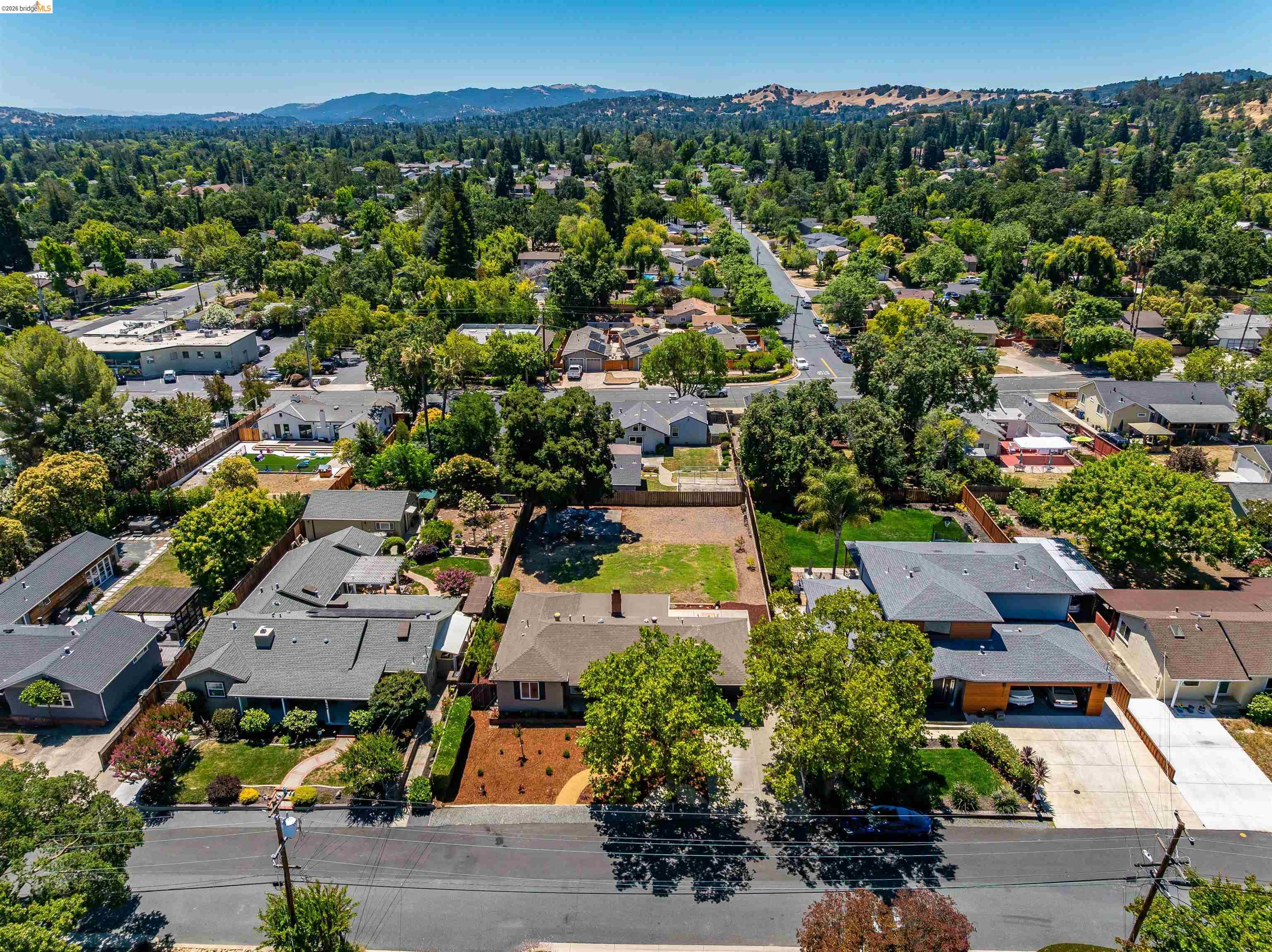 346 Valley View Road Pleasant Hill, CA 94523 - Photo 48 of 57 Expansive aerial overview showcasing a residential neighborhood with varied architectural styles and mature tree coverage
