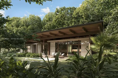 a view of house with outdoor seating