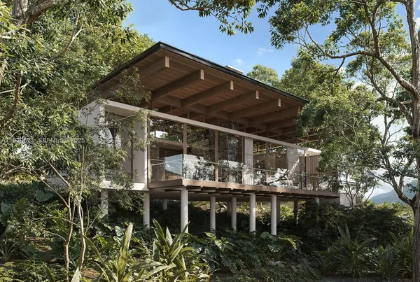 a view of house with front yard