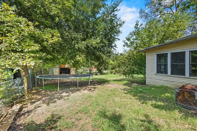 a house view with a sitting space and garden view