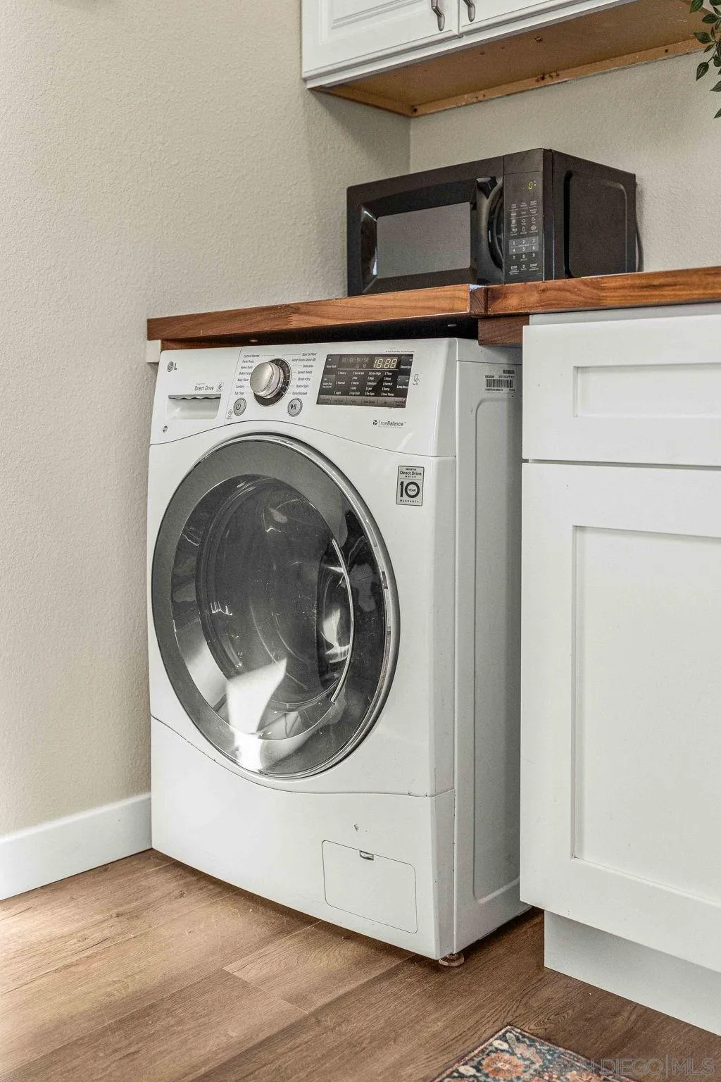 6081 Horton Drive, Unit CASITA La Mesa, CA 91942 - Photo 14 of 30 a utility room with dryer and washer