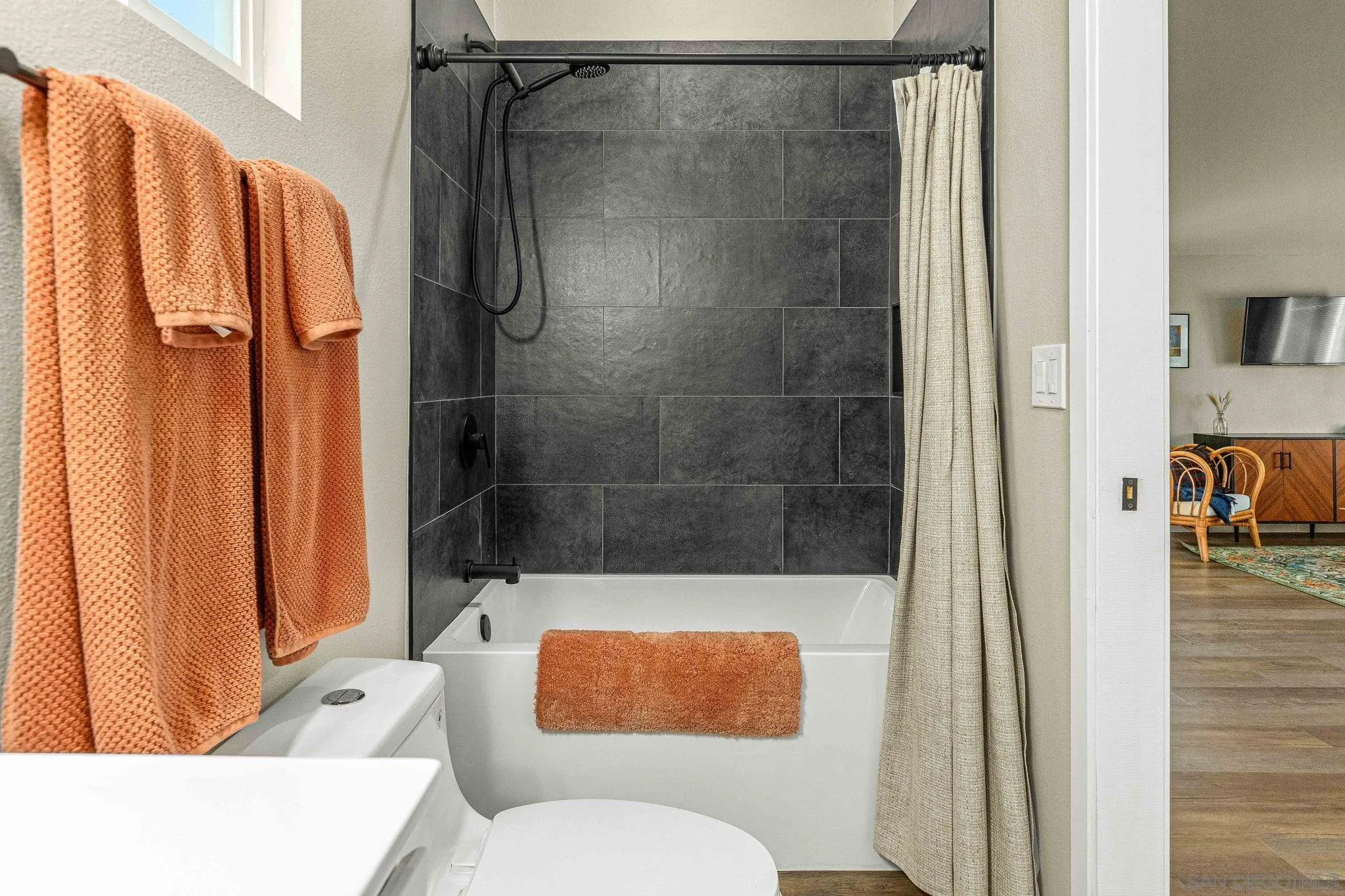 6081 Horton Drive, Unit CASITA La Mesa, CA 91942 - Photo 18 of 30 a bathroom with a shower a toilet and a shower