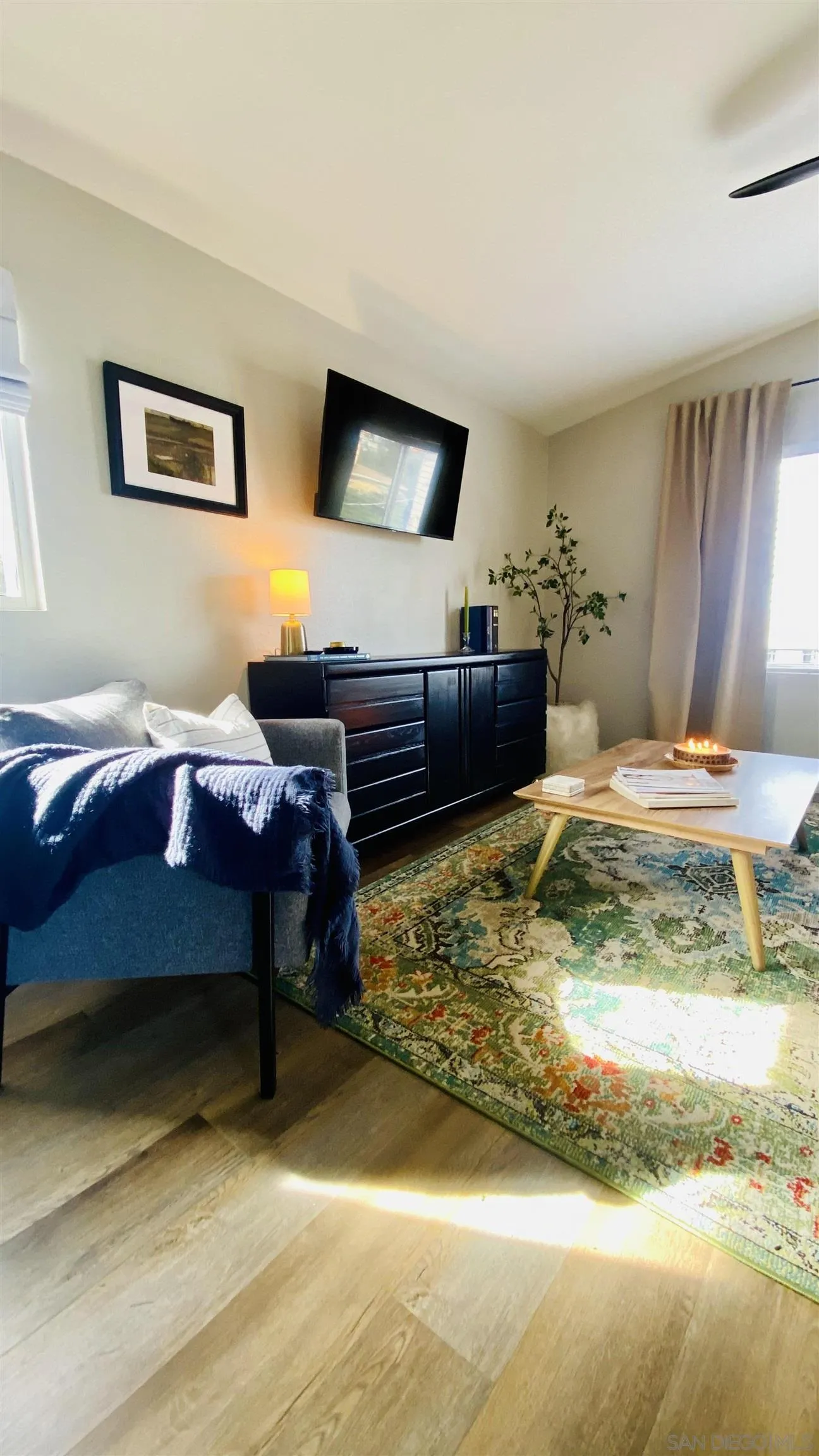 6081 Horton Drive, Unit CASITA La Mesa, CA 91942 - Photo 2 of 30 a living room with furniture and a rug