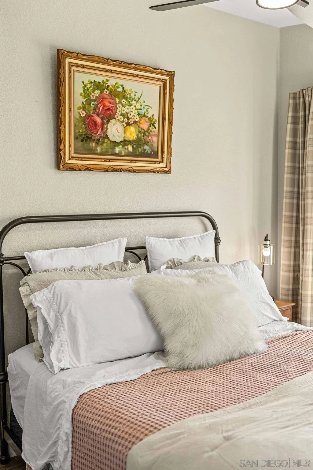 6081 Horton Drive, Unit CASITA La Mesa, CA 91942 - Photo 22 of 30 a bedroom with a bed and wall painting