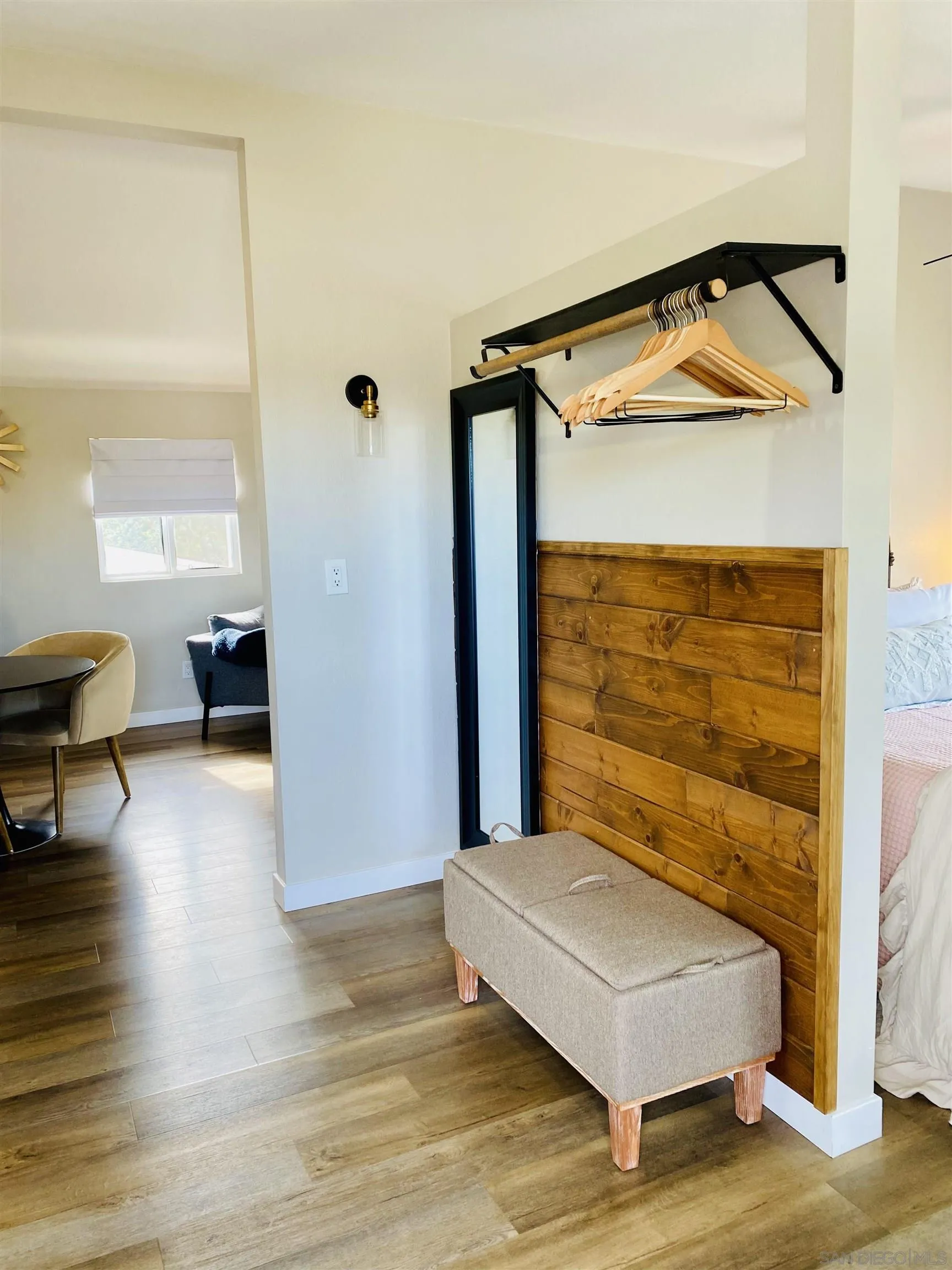 6081 Horton Drive, Unit CASITA La Mesa, CA 91942 - Photo 27 of 30 a bedroom with a bed and a table