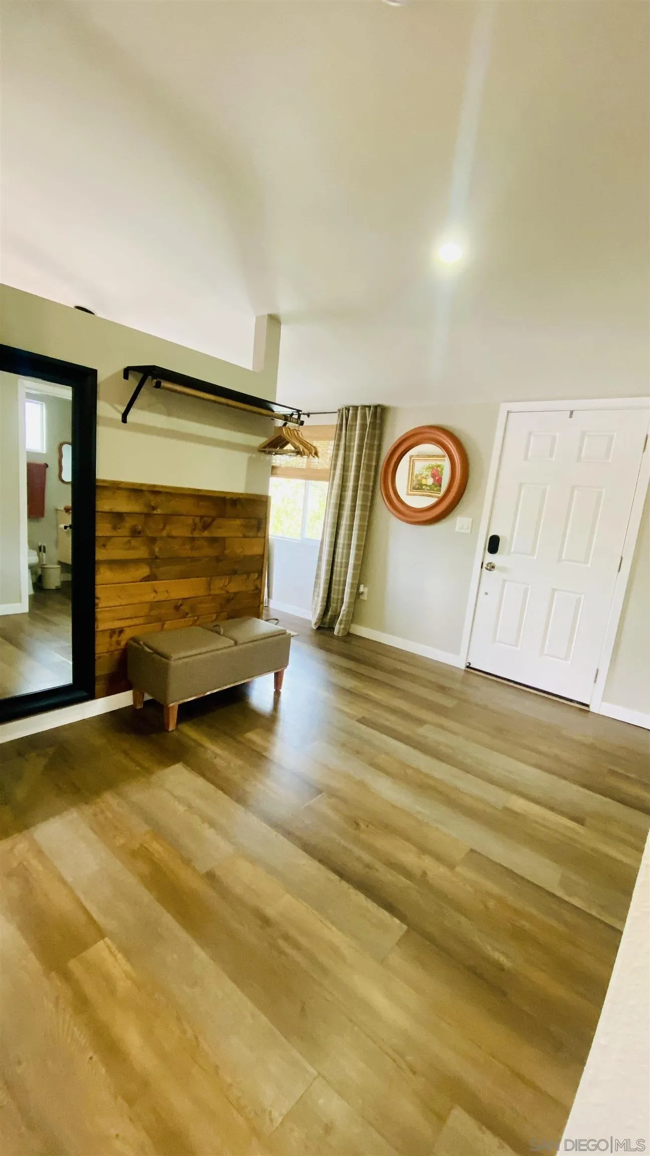 6081 Horton Drive, Unit CASITA La Mesa, CA 91942 - Photo 28 of 30 a view of a room with wooden floor