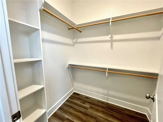 a view of an empty walk in closet