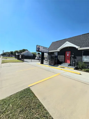 a swimming pool with outdoor seating