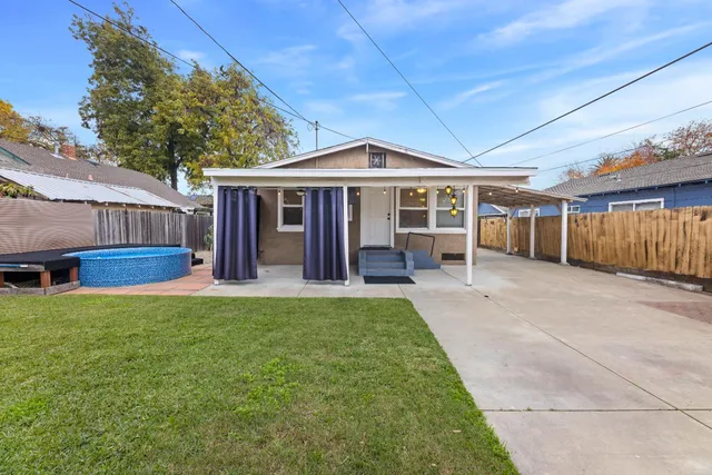 a view of a backyard with a garden