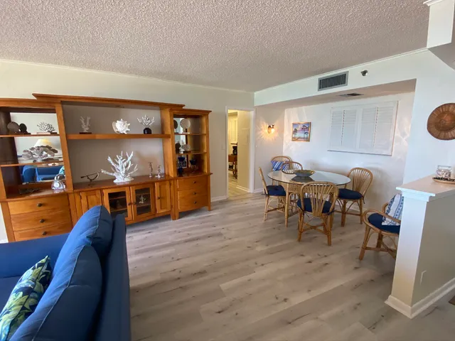 a view of a living room and dining room