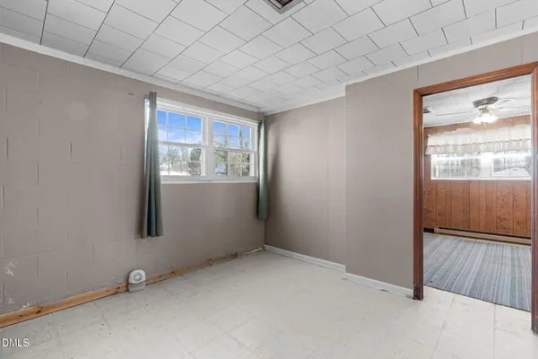 an empty room with windows