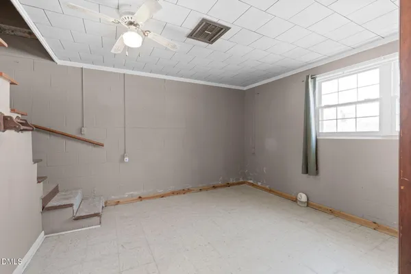 an empty room with windows