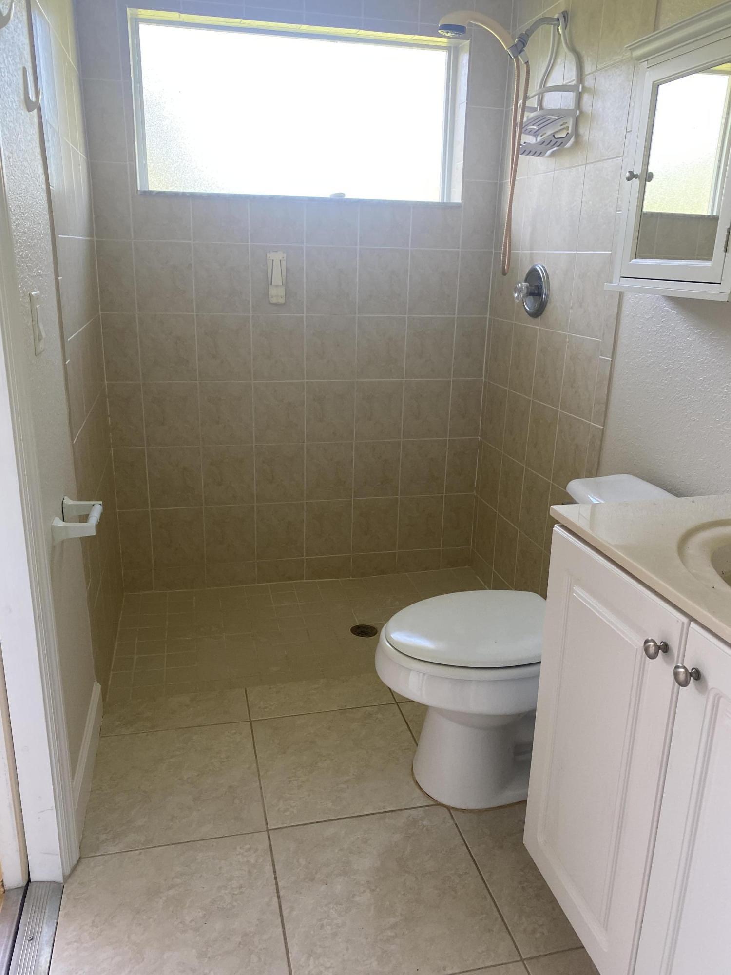 3504 Southwest Macon Road Port St. Lucie, FL 34953 - Photo 15 of 15 Inlaw suite bathroom