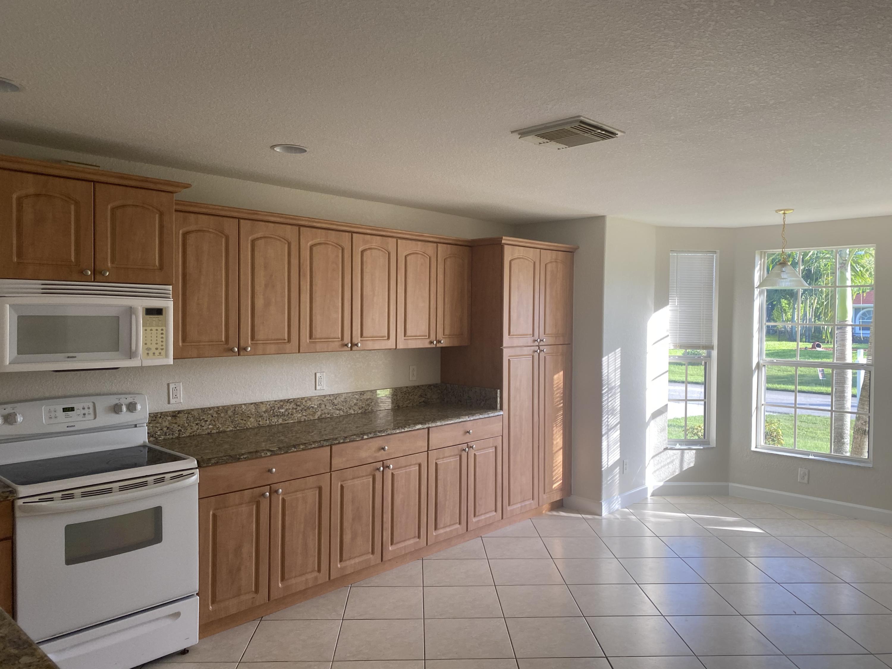 3504 Southwest Macon Road Port St. Lucie, FL 34953 - Photo 4 of 15 Kitchen View