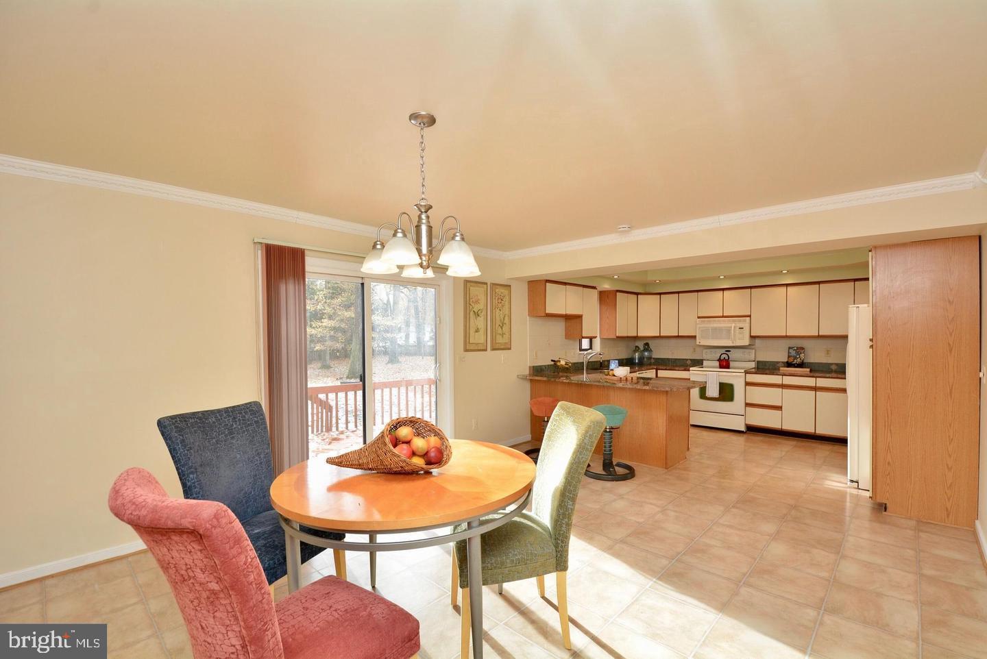 8421 Alvin Road Pasadena, MD 21122 - Photo 22 of 54 a view of a dining room with furniture