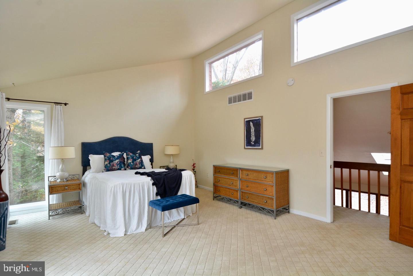 8421 Alvin Road Pasadena, MD 21122 - Photo 40 of 54 a bedroom with furniture and a window