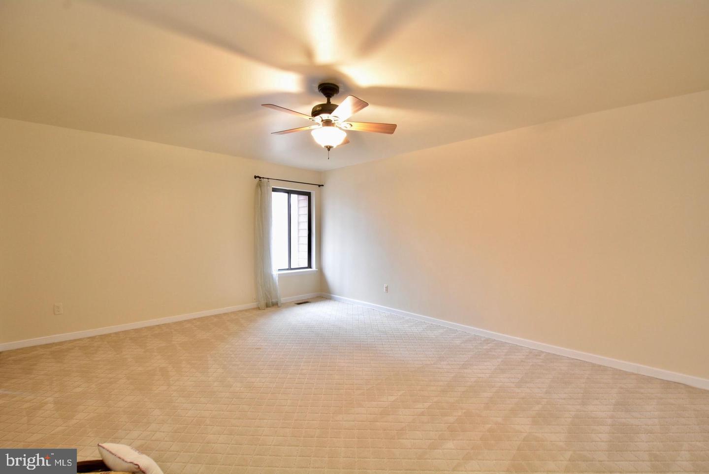 8421 Alvin Road Pasadena, MD 21122 - Photo 46 of 54 a view of empty room with fan