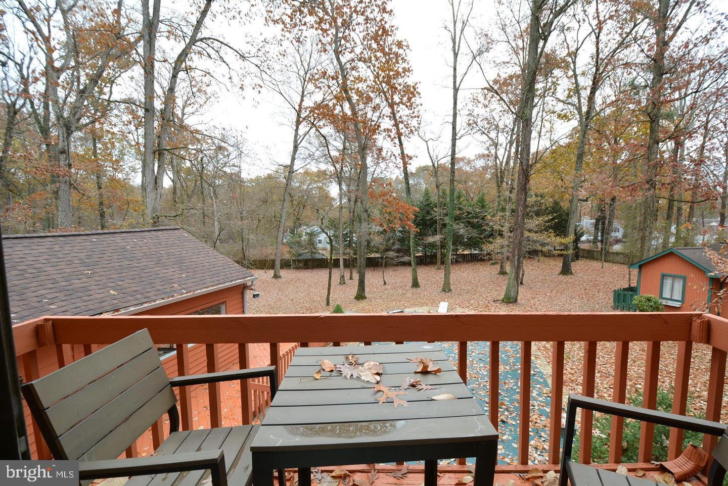 8421 Alvin Road Pasadena, MD 21122 - Photo 51 of 54 a view of a patio with iron fence