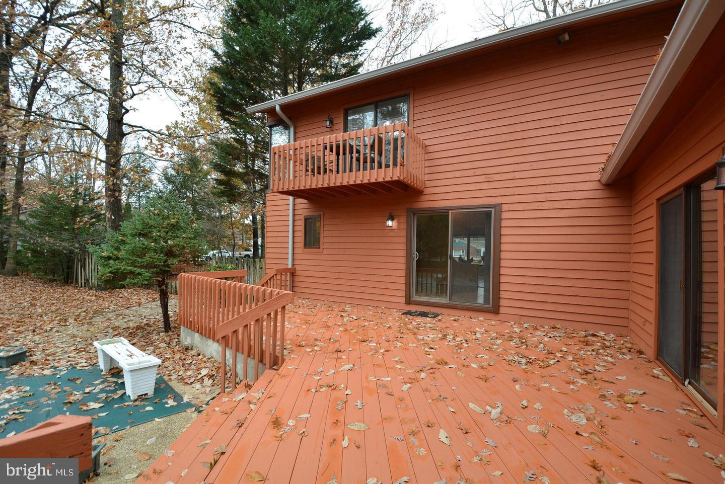 8421 Alvin Road Pasadena, MD 21122 - Photo 52 of 54 a front view of a house with a yard