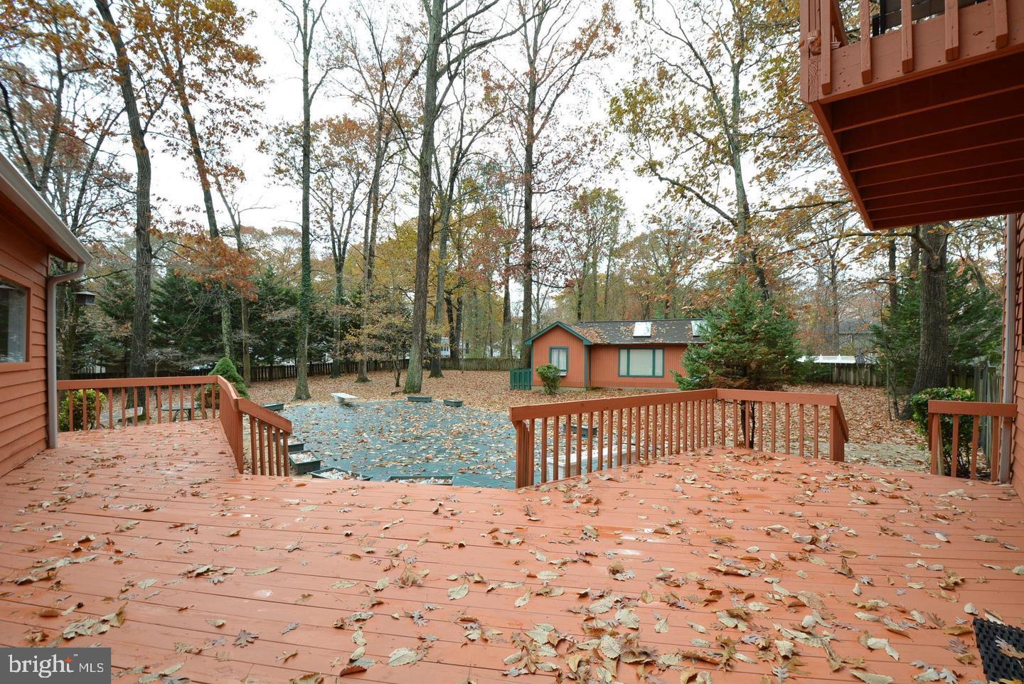 8421 Alvin Road Pasadena, MD 21122 - Photo 53 of 54 a view of a dinning table and chairs in the patio
