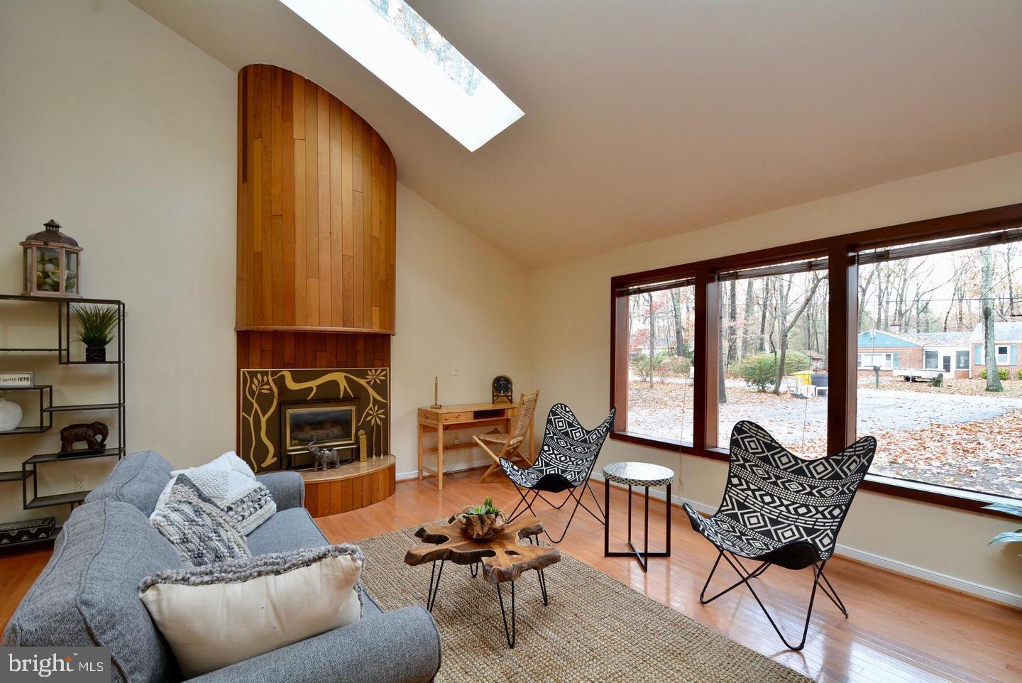 8421 Alvin Road Pasadena, MD 21122 - Photo 6 of 26 a living room with furniture and a floor to ceiling window