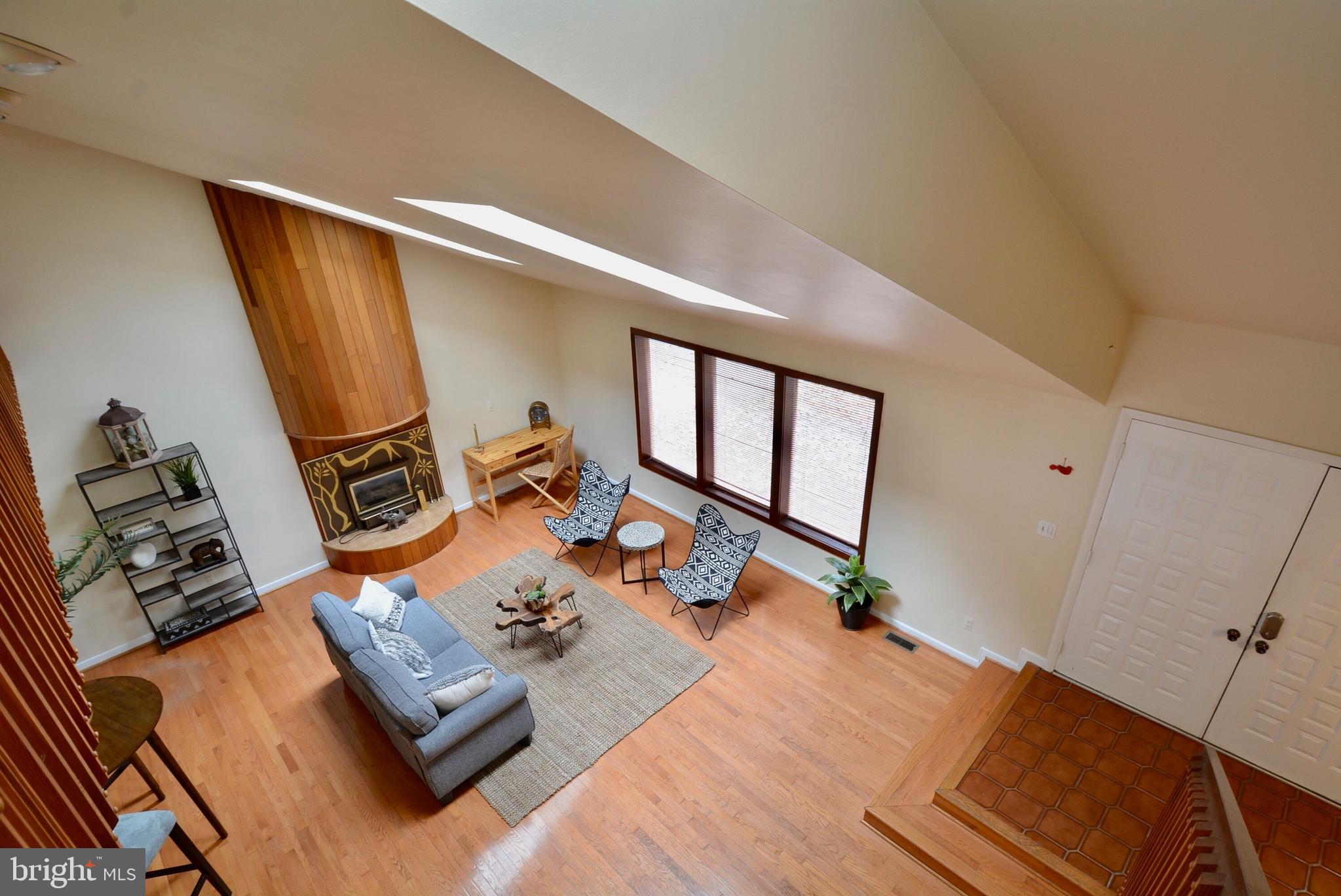 8421 Alvin Road Pasadena, MD 21122 - Photo 7 of 26 a bed sitting in a room next to a window