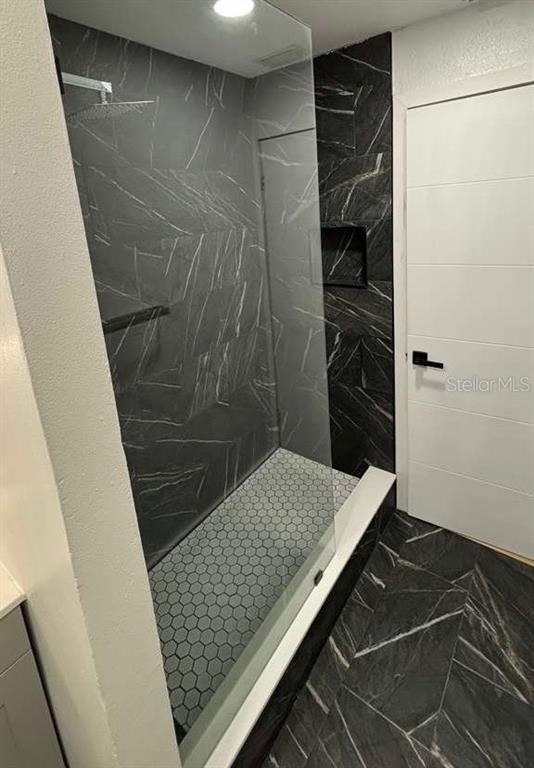 101 West Celeste Street Apopka, FL 32703 - Photo 27 of 47 a bathroom with a shower