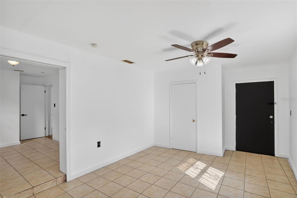 101 West Celeste Street Apopka, FL 32703 - Photo 37 of 47 a view of an empty room with chandelier fan