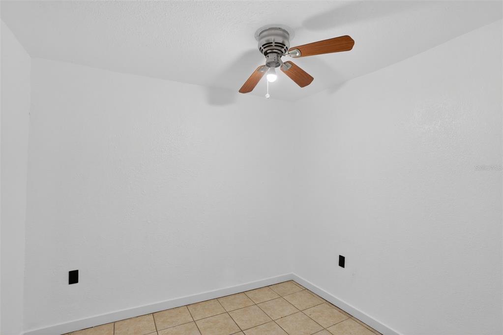 101 West Celeste Street Apopka, FL 32703 - Photo 38 of 47 a view of a room with racks on the wall