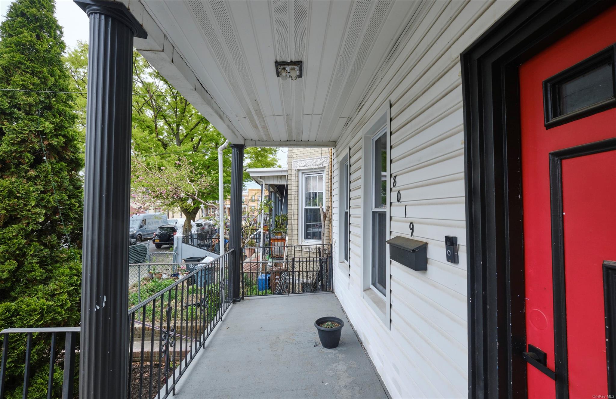 80-19 86th Road Queens, NY 11421 - Photo 2 of 26 a view of a porch