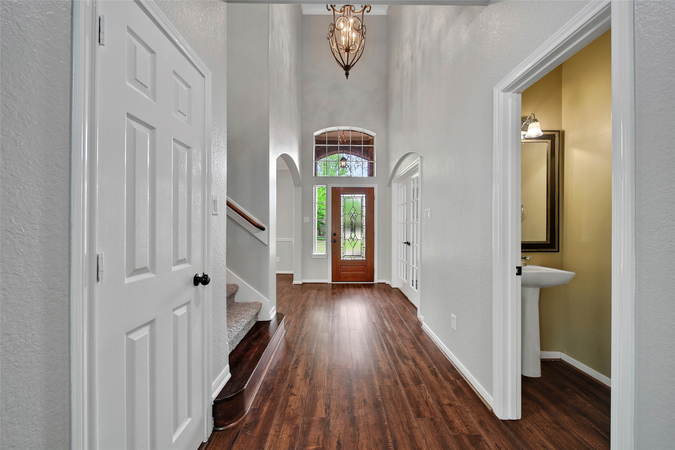 3 Murmuring Creek Place Conroe, TX 77385 - Photo 8 of 50 a view of gallery with wooden floor
