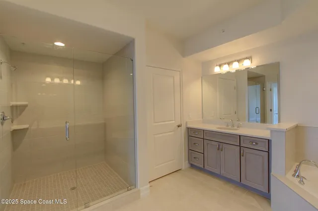 a view of an empty room and fire place