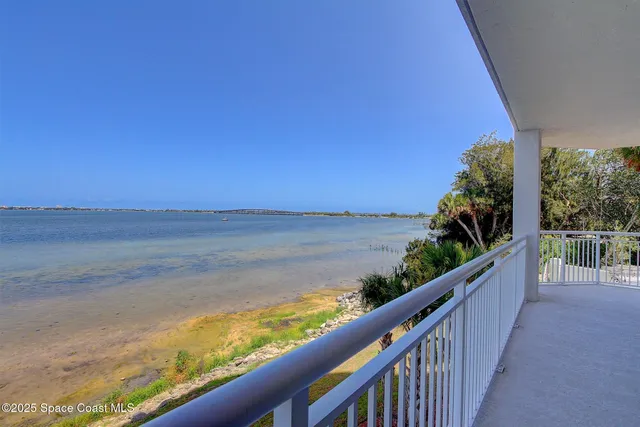 a view of a balcony with lake view