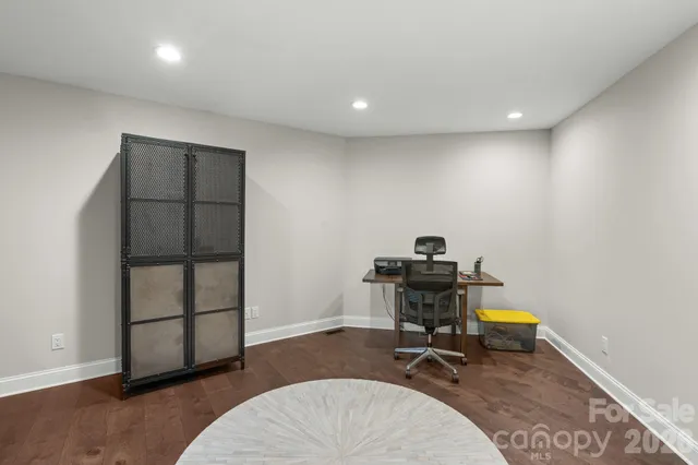 a workspace with furniture and window