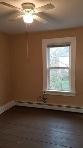 a view of a window in an empty room
