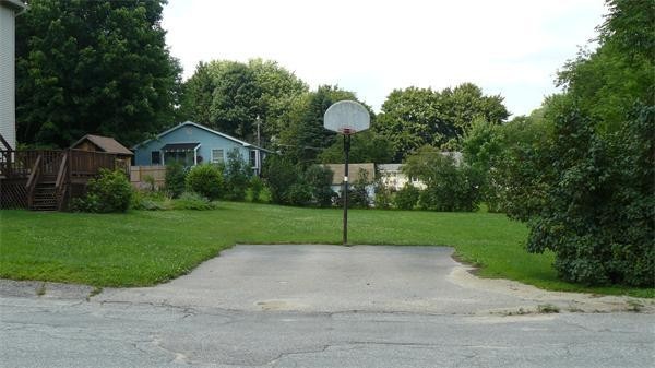 63 Harrington Street, Unit 2 Southbridge, MA 01550 - Photo 15 of 15 a view of a house with a backyard