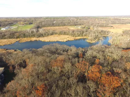 an aerial view of residential building and ocean