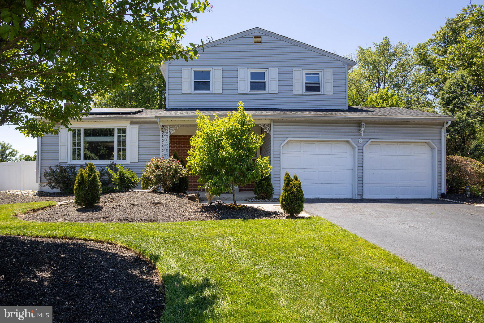 9 Wolfpack Road Hamilton, NJ 08619 - Photo 1 of 57 Charming home with lush greenery.