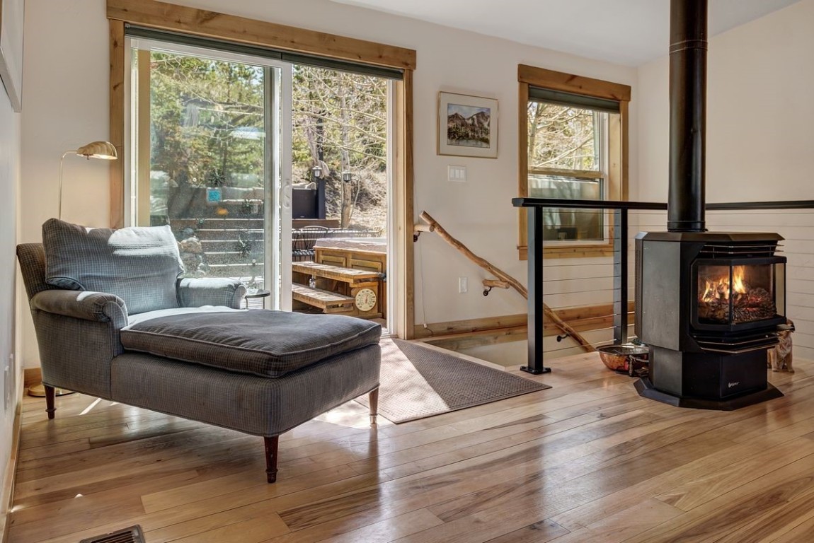 379 Hummingbird Circle Silverthorne, CO 80498 - Photo 20 of 44 a living room with furniture and wooden floor