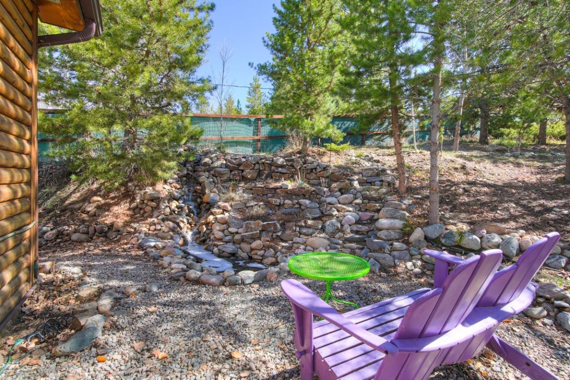 379 Hummingbird Circle Silverthorne, CO 80498 - Photo 35 of 44 a view of a chairs and table in a yard