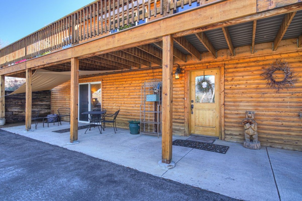 379 Hummingbird Circle Silverthorne, CO 80498 - Photo 39 of 44 a view of a patio with table and chairs