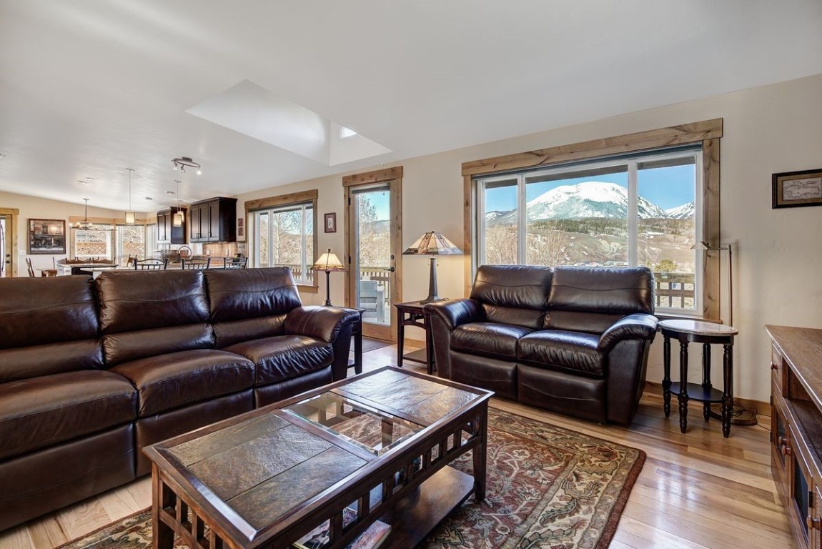 379 Hummingbird Circle Silverthorne, CO 80498 - Photo 10 of 44 a living room with furniture and a window