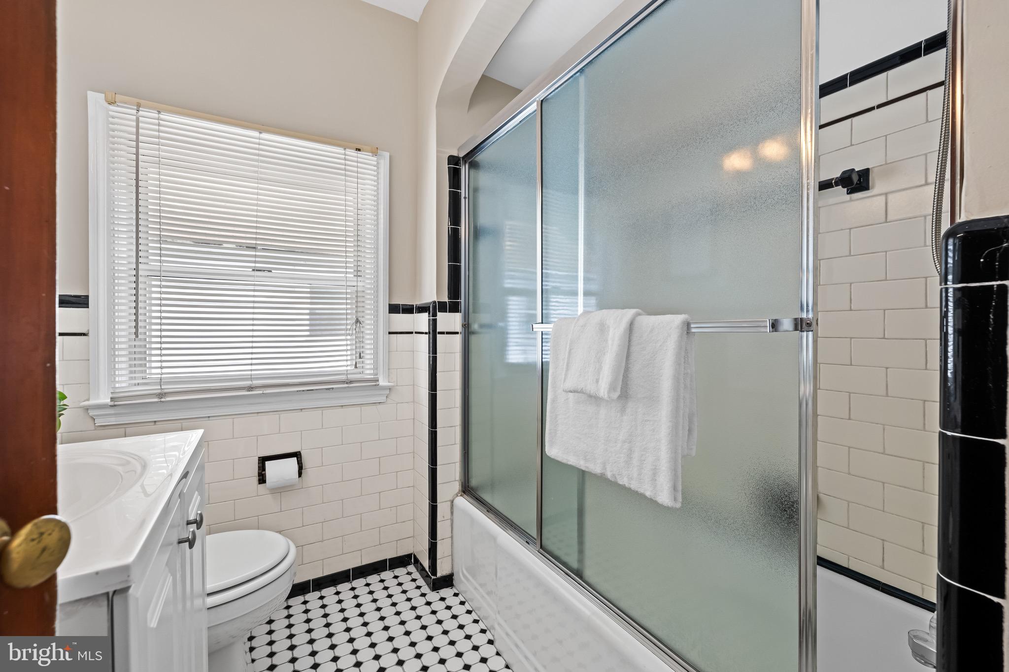 6806 Dunhill Road Baltimore, MD 21222 - Photo 24 of 45 a bathroom with a shower