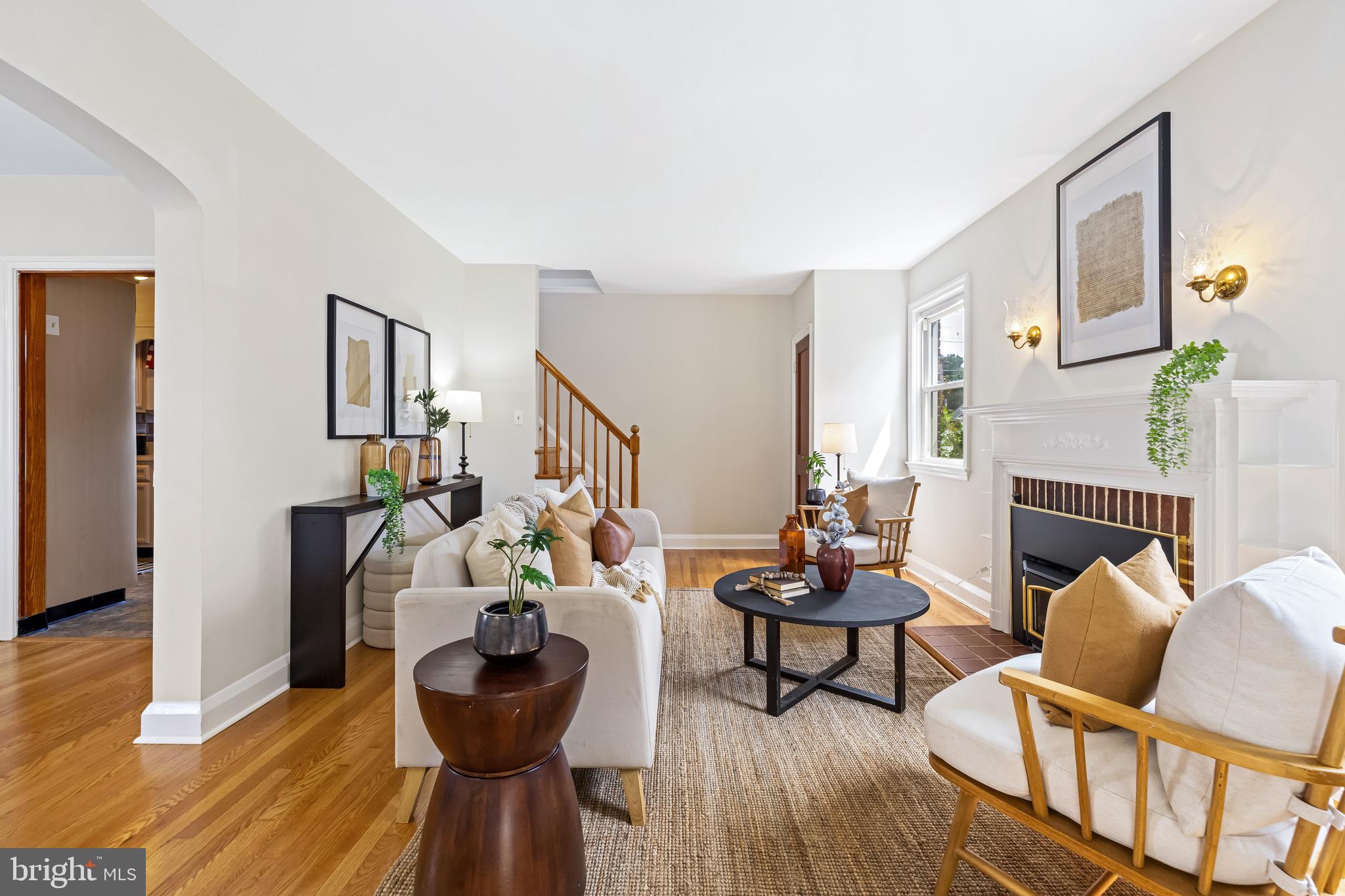 6806 Dunhill Road Baltimore, MD 21222 - Photo 3 of 45 a living room with furniture and wooden floor
