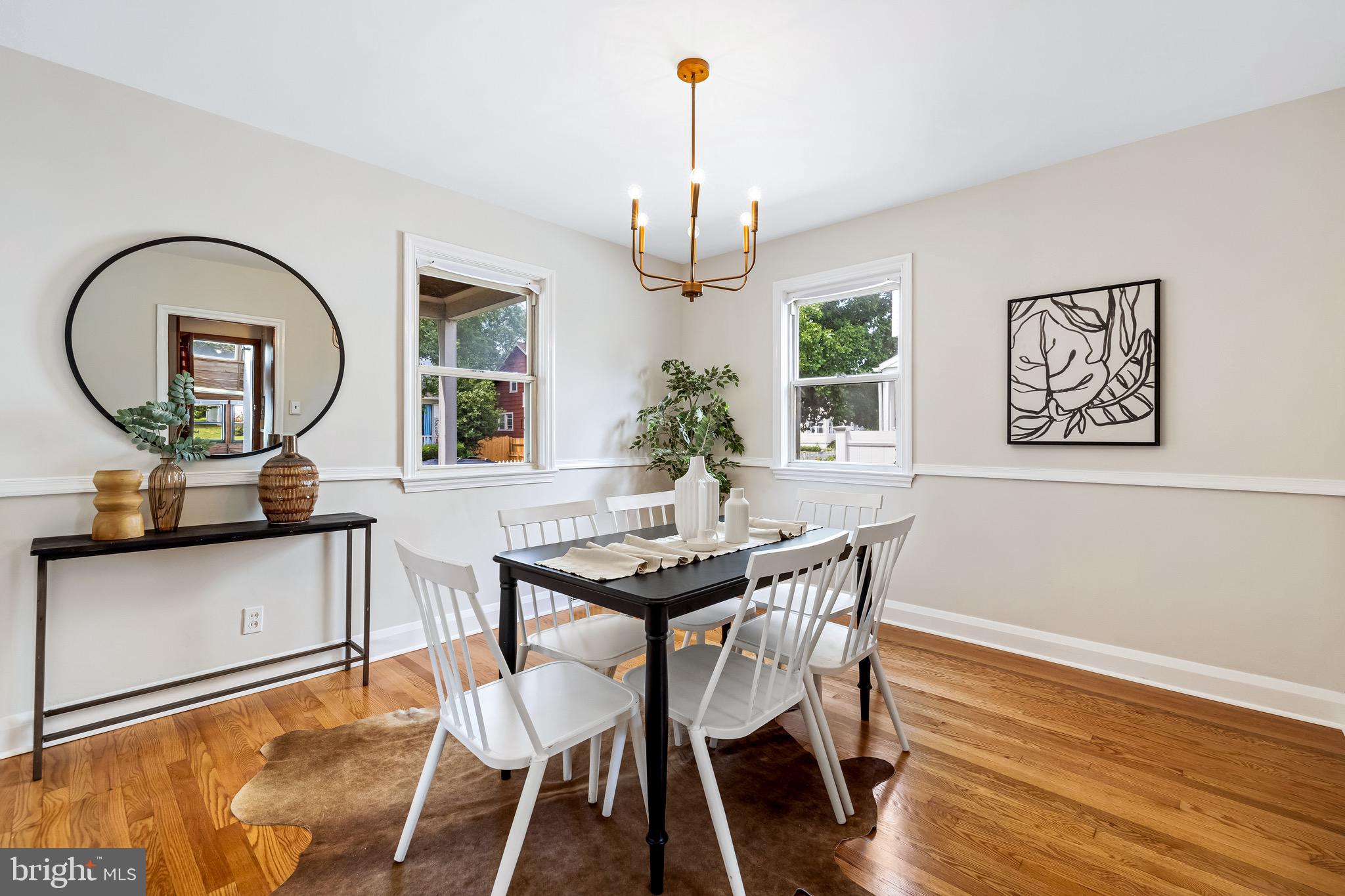 6806 Dunhill Road Baltimore, MD 21222 - Photo 8 of 45 a view of a dining room with furniture window and wooden floor