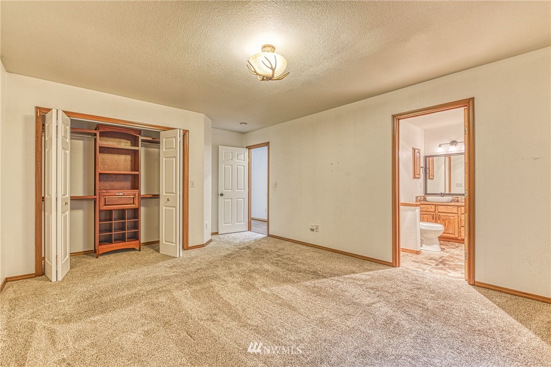 18212 Empire Street Southwest Rochester, WA 98579 - Photo 15 of 29 a view of an empty room with closet and workspace