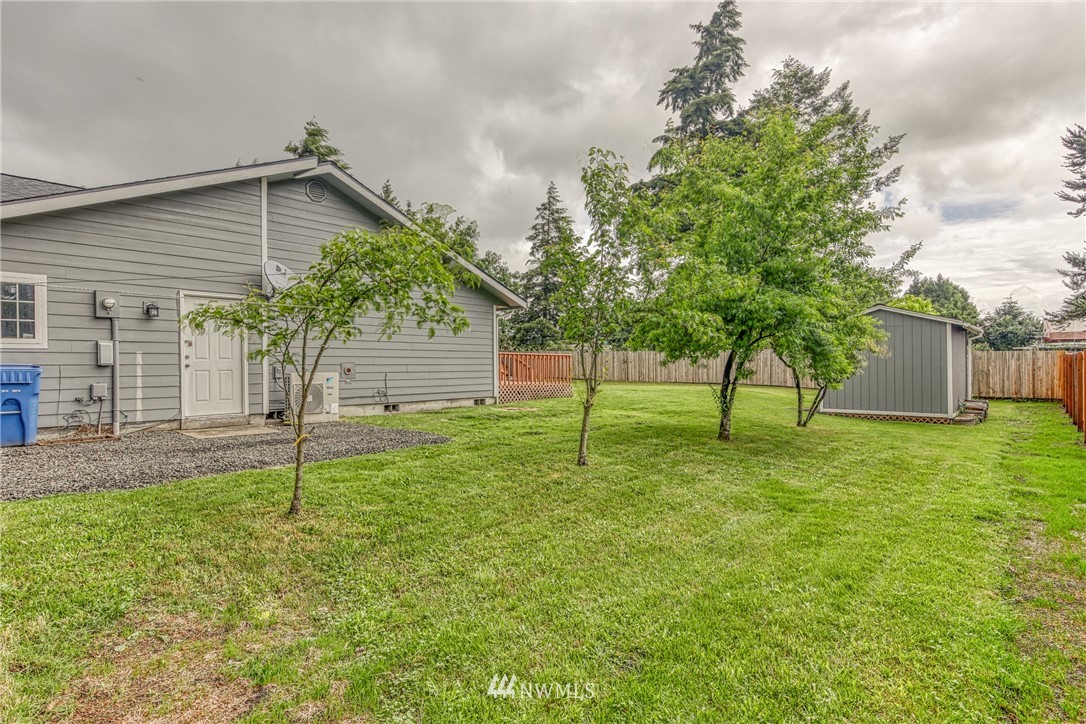 18212 Empire Street Southwest Rochester, WA 98579 - Photo 3 of 29 a house view with a garden space