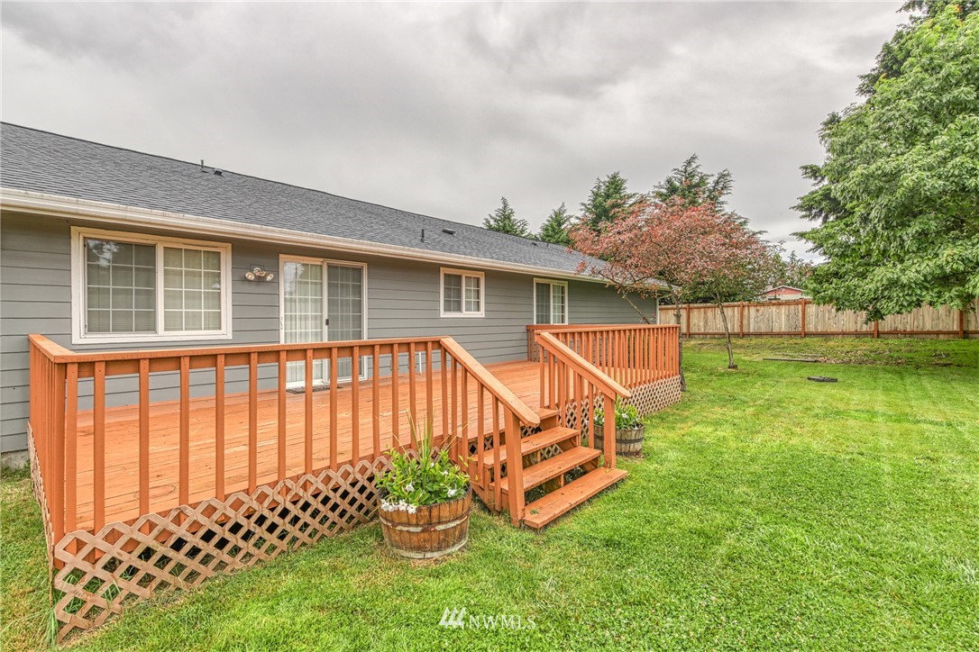 18212 Empire Street Southwest Rochester, WA 98579 - Photo 22 of 29 a view of backyard with deck and garden