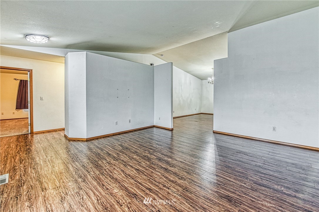 18212 Empire Street Southwest Rochester, WA 98579 - Photo 26 of 29 a view of a livingroom with wooden floor