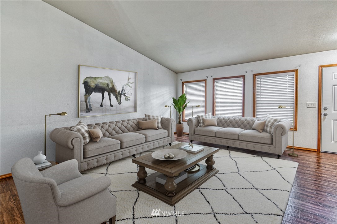 18212 Empire Street Southwest Rochester, WA 98579 - Photo 5 of 29 a living room with furniture and wooden floor